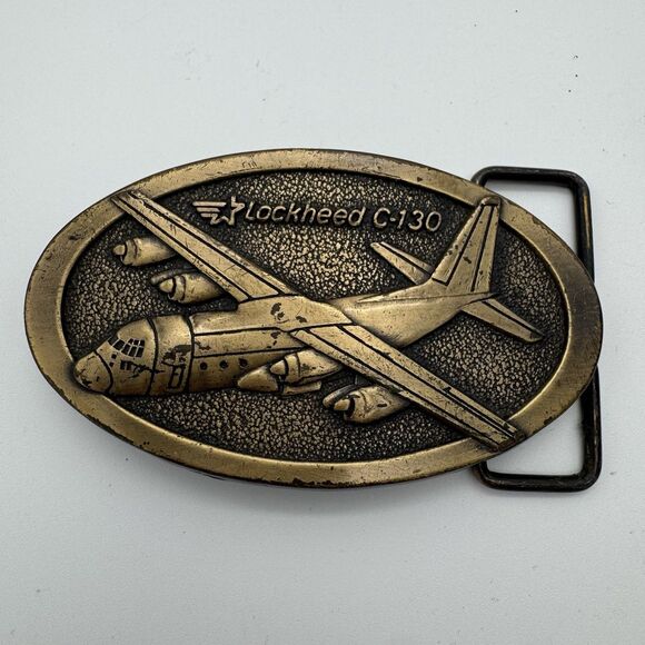 VTG brass belt buckle featuring Lockheed C-130 Hercules aircraft Pilot Plane - Picture 1 of 4